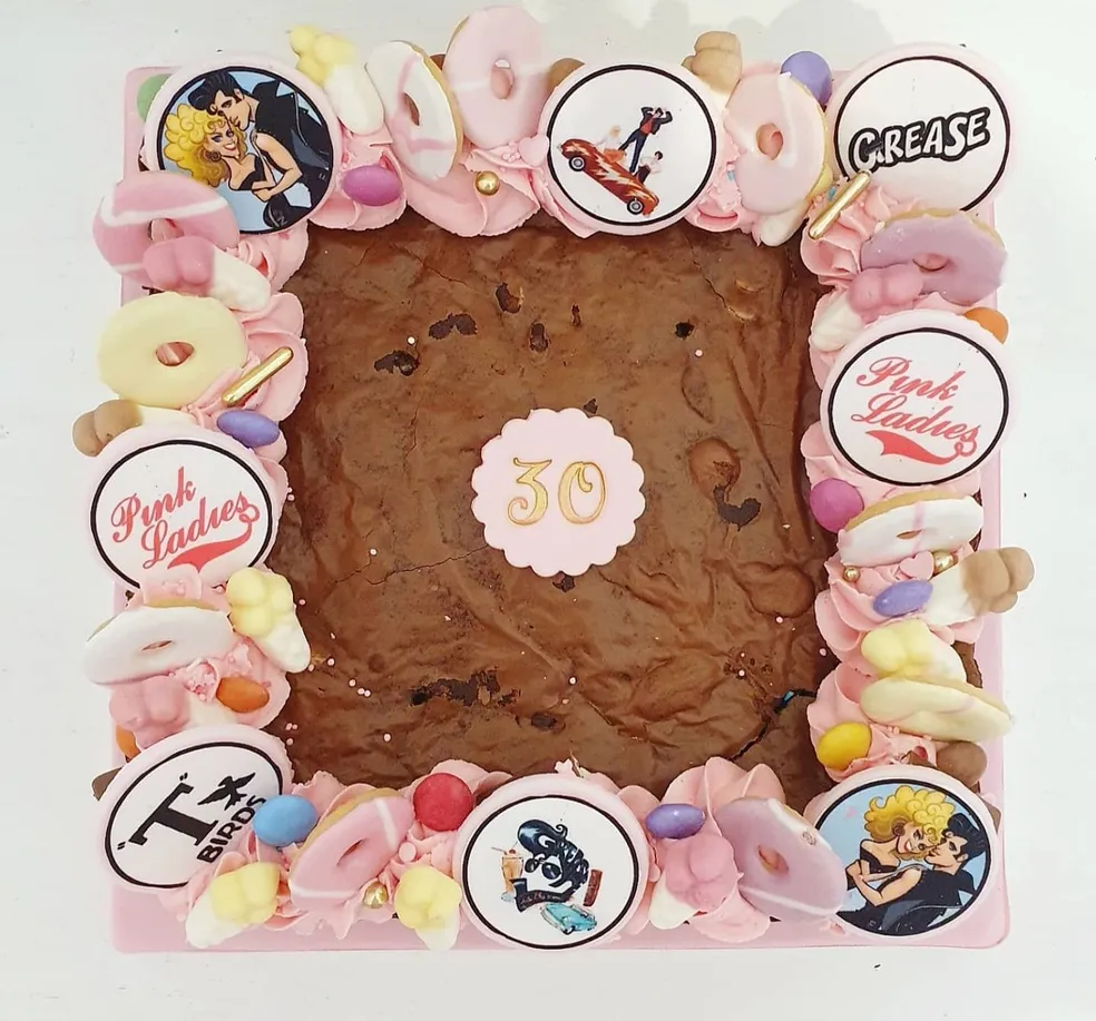 Cookie slab with pink drizzle, marshmallows, white chocolate and Happy Birthday Mummy heart topper