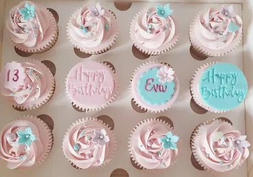 Pink and grey baby shower cupcakes with elephant fondant toppers and Oh Baby disc, with elephant figurine